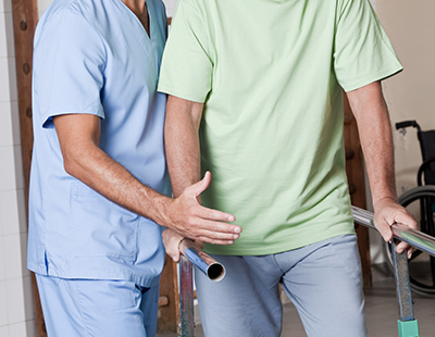 Physical Therapy for patients in a green shirt in Kensington.